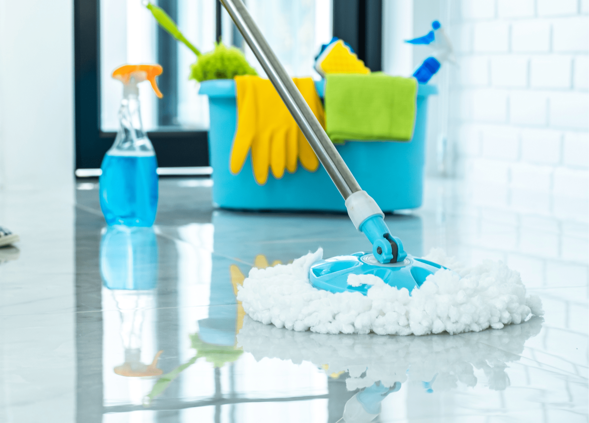 An informative image showcasing sparkling clean floors with expert tips for floor cleaning, featuring tools and techniques from The Real Maids for achieving a pristine finish.