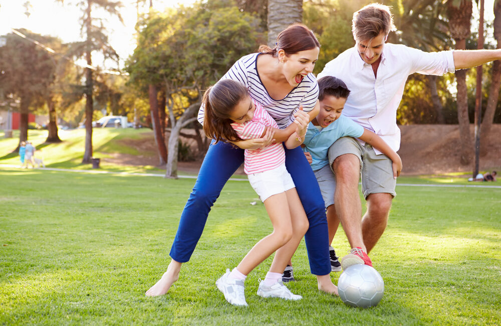Family enjoying quality time — refer a friend to The Real Maids